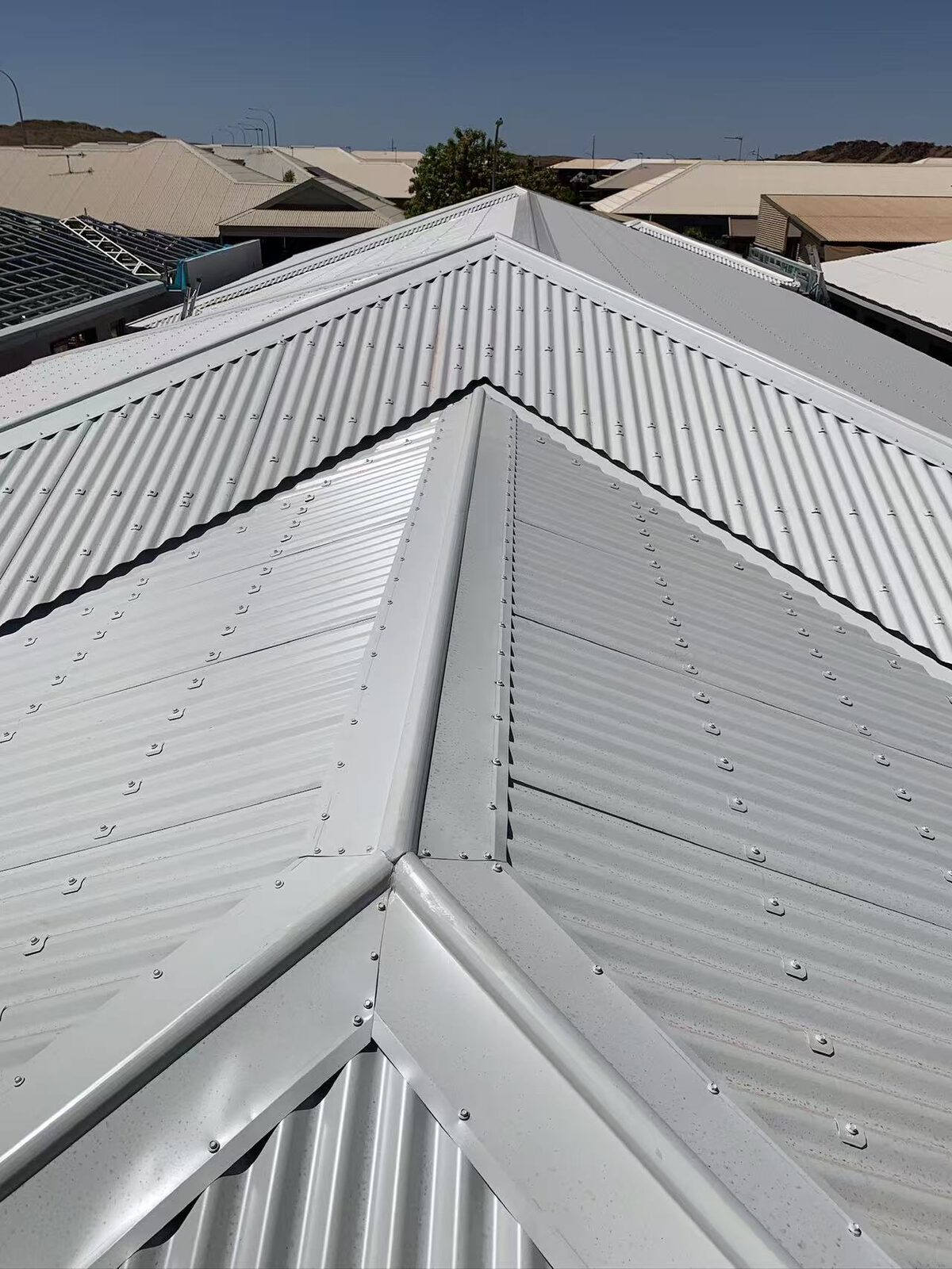 Precision Colorbond ridge capping work